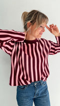 Pull en maille rayée rose et bordeaux