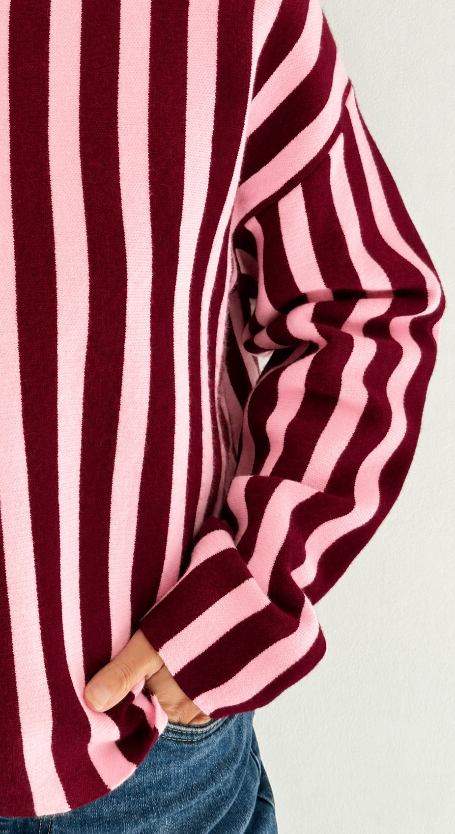 Pull en maille rayée rose et bordeaux