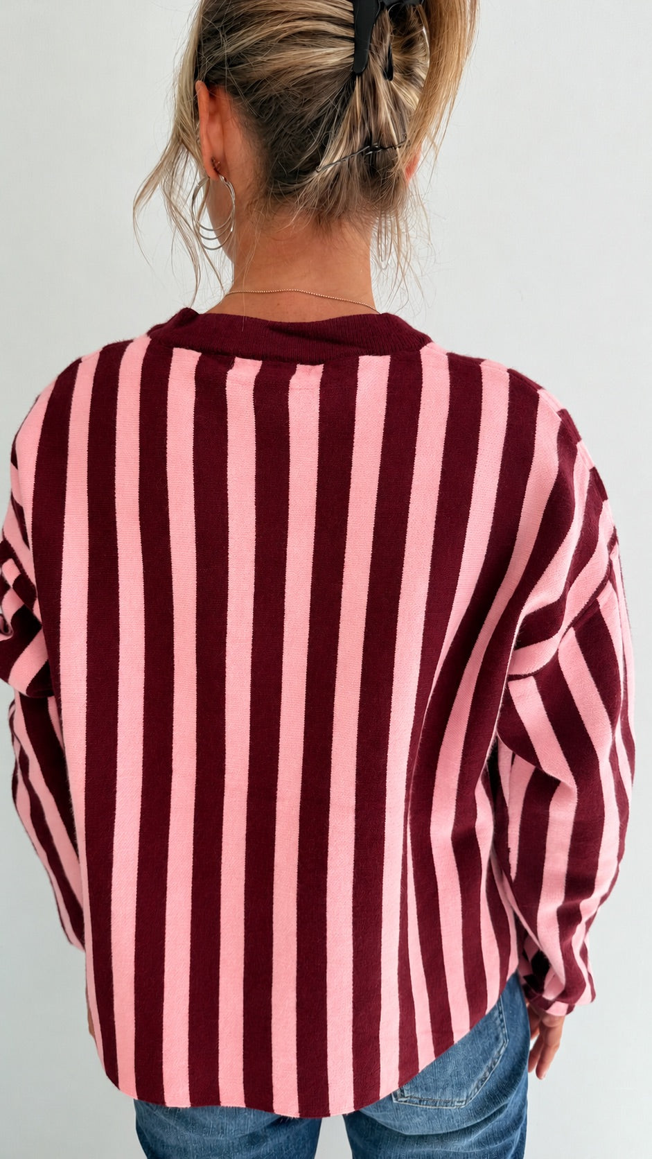 Pull en maille rayée rose et bordeaux